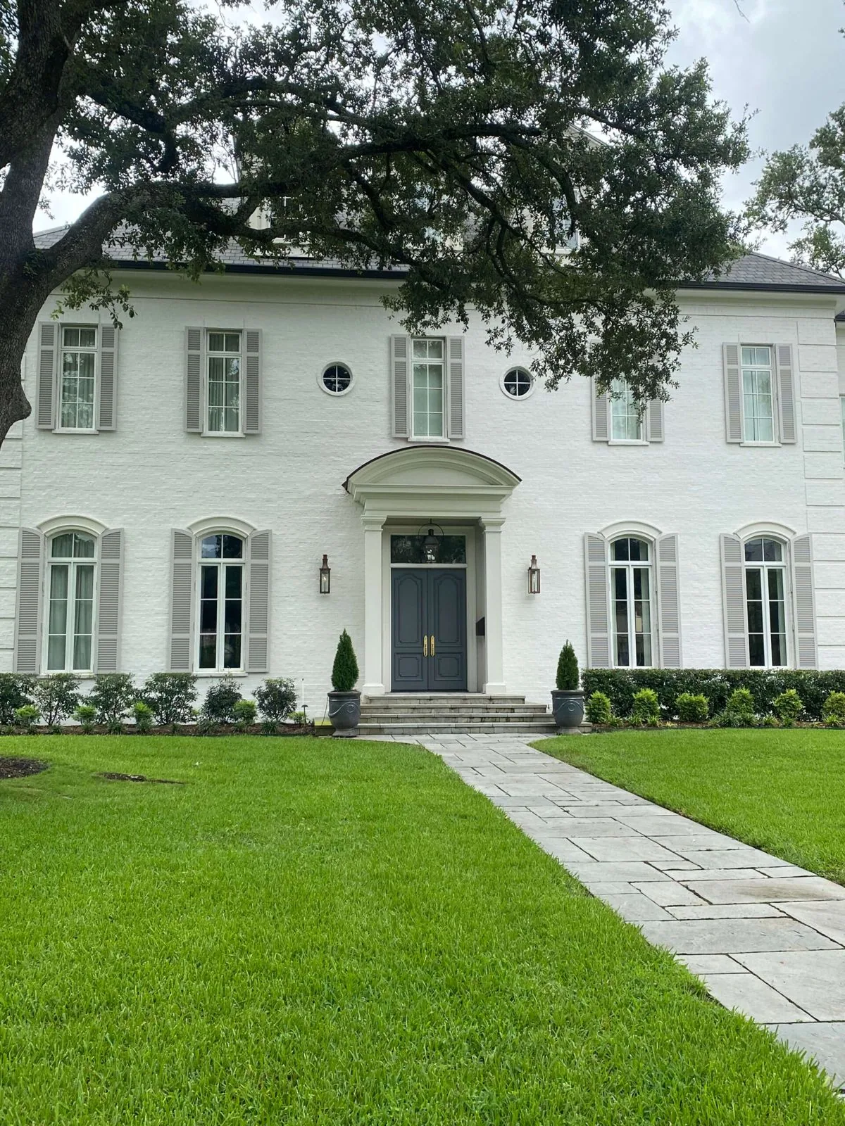Classic white home with new replacement windows